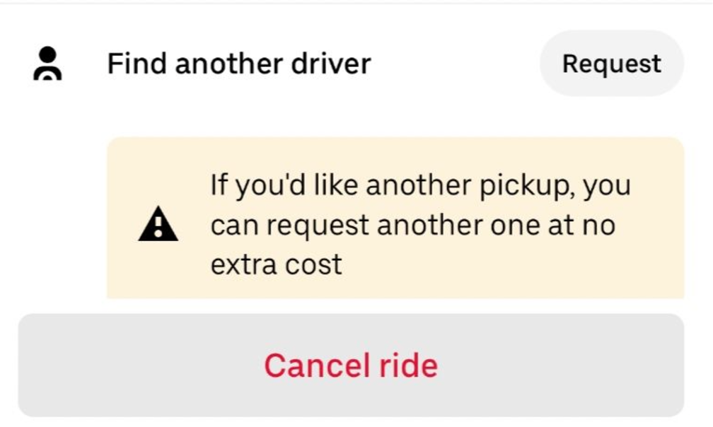 A rider using Uber's 'Find Another Driver' feature on their phone, seamlessly switching to a new driver without extra charges or delays.